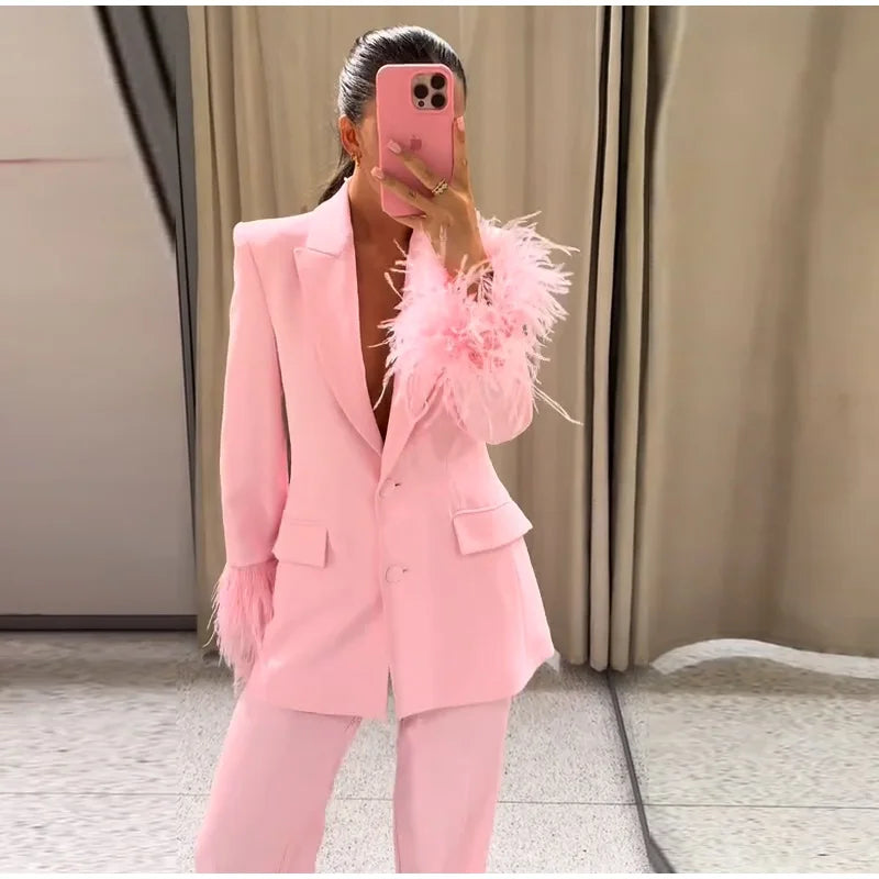 BLAZER ROSA CON PUÑO PLUMAS