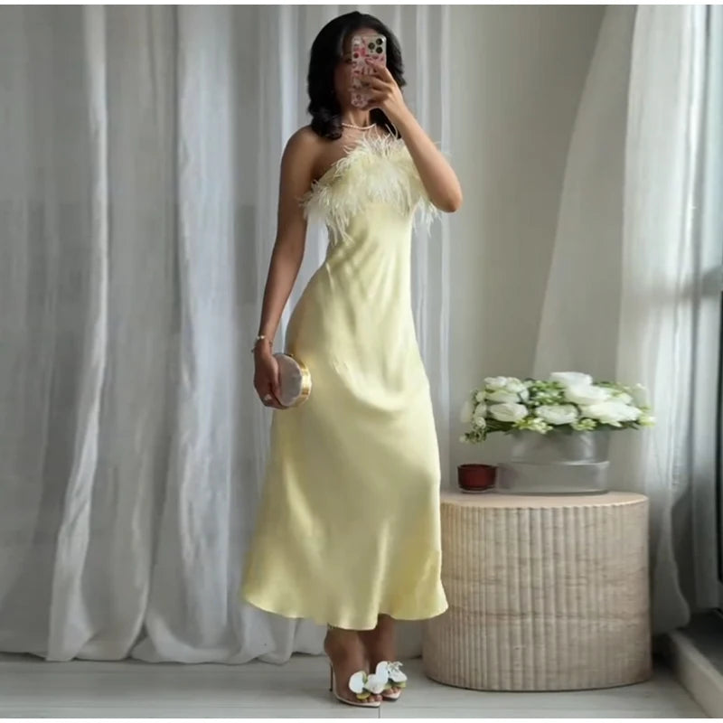 VESTIDO AMARILLO PLUMAS