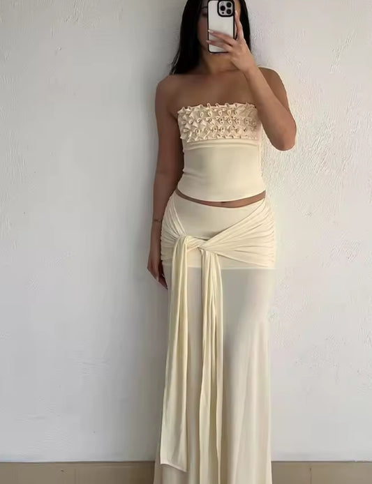 CONJUNTO TOP RELIEVE CON FALDA DE NUDO